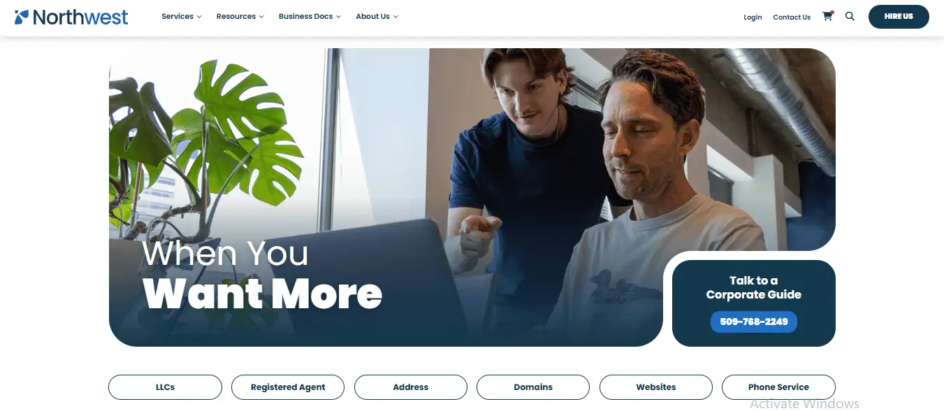 Northwest Registered Agent homepage showing two people working at a laptop and links to LLC formation, registered agent and business services.